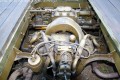 tvorvalcov vzduchom chladen motor T 52 s objemom 1910 ccm a vkonom 27,4 HP je uloen pod drevenou ploinou, uchyten je na rm, umiestnen je medzi npravami, RD Koice, 25.4.2009